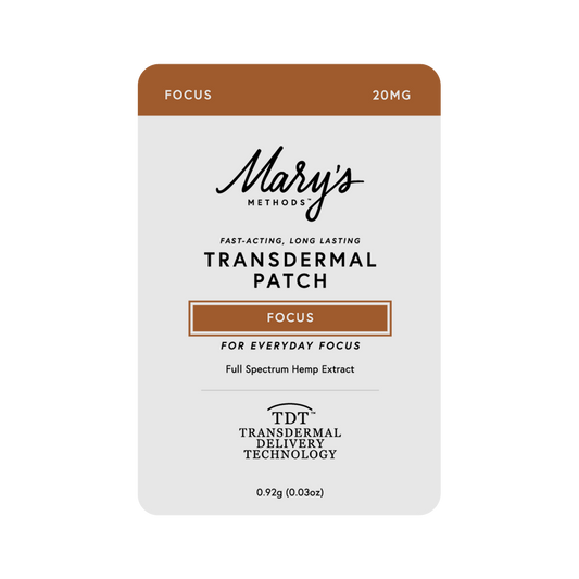 A single Mary's Methods Focus 20mg transdermal patch package on a plain white background. The rectangular card-style box has rounded corners, a white main field, and brown blocks at the top and around the 'Focus' label.